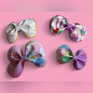 Faux leather hair bows with silver alligator clips. Valentine theme.